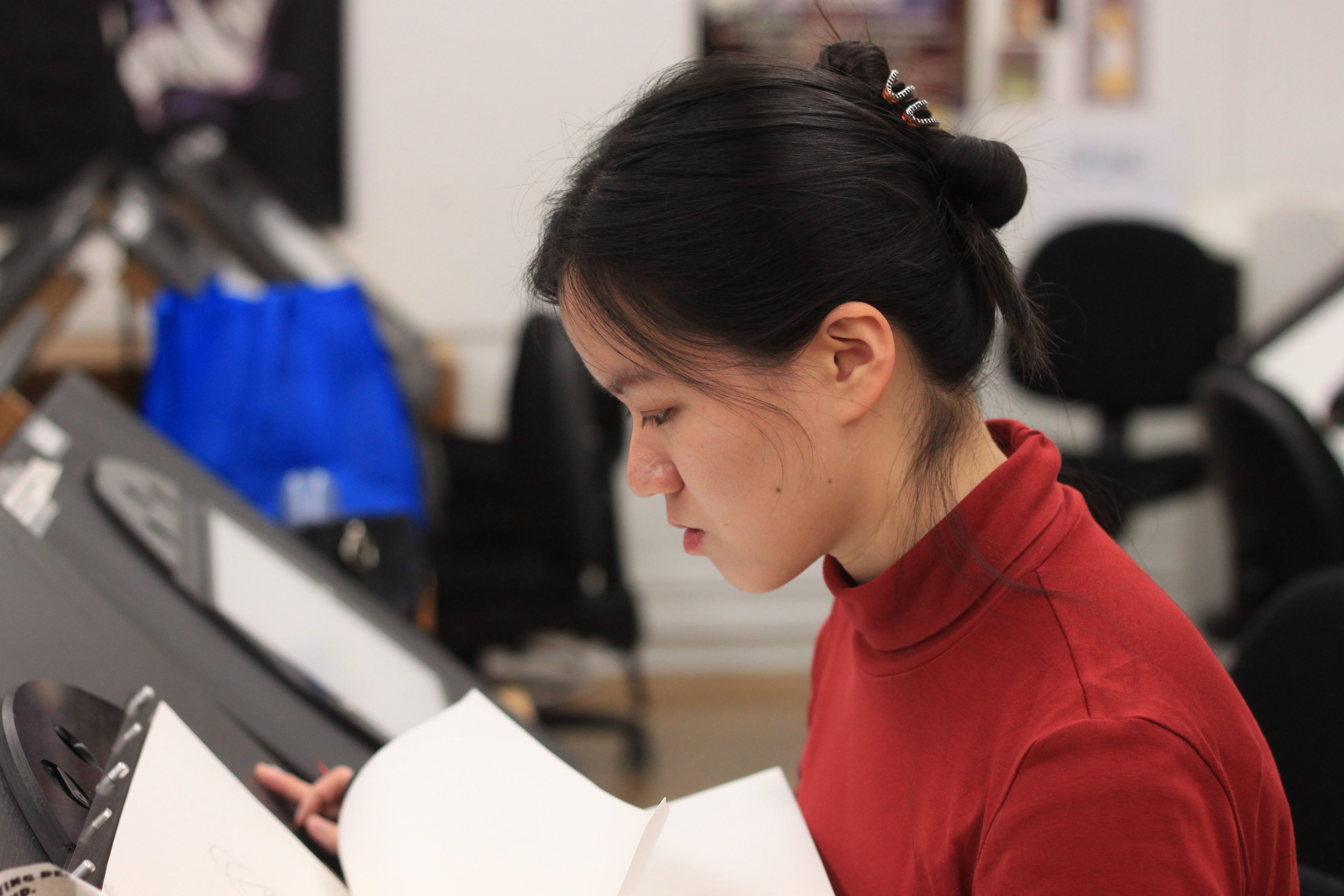 Tina Hsu working in the lab on her film, "LADY and the frog."